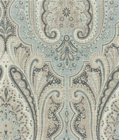 an ornate blue and beige wallpaper with paisley designs on it's sides,