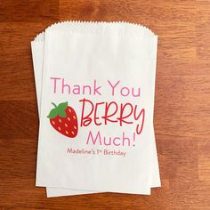 thank you berry munch paper bag on wooden table with name and date printed on it