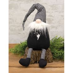 Black & White Buffalo Check Tuxedo Gnome is sand-weighted and features a black tuxedo with aback antiwhite gingham hat, matching legs, and bowtie. Gnome has long, dangling legs that look great hanging from a stool, riser, or tabletop and its hat is wired for desired adjustments. Measures 11.5" high by 5" wide. Trinx | Trinx Claye Tuxedo Gnome 11.5 H x 5.0 W x 5.5 D in black / brown / gray / whiteFabric in Black / White | 11.5" H X 5" W X 5.5" D | Wayfair | Home Decor Black And White Gingham, Black Tuxedo, White Buffalo, Buffalo Check, Looks Great, Brown And Grey, Gingham, Tulle Skirt, Black And Brown