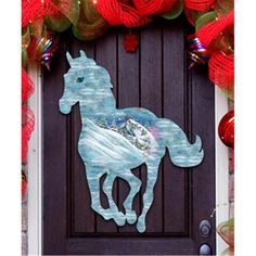 a door with a horse painted on it and red decorations around the front entrance area