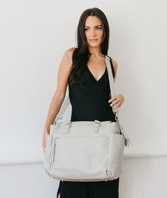 Introducing The Gemini – the epitome of versatility and elegance. This refined bag seamlessly transitions to suit your every need: wear it as a sophisticated backpack, drape the top handles over your shoulder, carry it crossbody, or hold it gracefully in the crook of your arm. Designed to accommodate your 17" laptop, The Gemini features a built-in padded laptop sleeve, ensuring your device remains secure and protected. With ten spacious pockets, organizing your essentials has never been so effor White Multifunctional Backpack, White Rectangular Leather Backpack With Detachable Strap, Gemini Convertible Backpack, White Rectangular Backpack With Zipper Closure, Sophisticated Backpack, Multifunctional Rectangular Backpack With Anti-theft Pocket, Convertible Backpack, Tassel Keychain, Crossbody Clutch