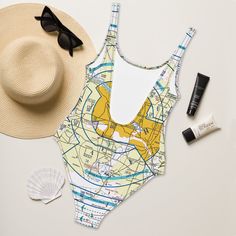 Show your love of aviation with this one-piece swimsuit. Enjoy the smooth fabric and the flattering design, featuring the Dallas - Ft. Worth Flyway Chart. This product comes with free US shipping. • 82% Polyester, 18% Spandex • Fabric weight: 6.78 oz/yd² (230 g/m²), weight may vary by 5% • Chlorine-resistant fabric • Cheeky fit with a scoop neckline and a low scoop back • Zig-zag stitching • Double-layer front • Four-way stretch material stretches and recovers on the cross and lengthwise grains Size guide CHEST WAIST HIPS XS (inches) 33 ⅛ 25 ¼ 35 ⅜ S (inches) 34 ⅝ 26 ¾ 37 M (inches) 36 ¼ 28 ⅜ 38 ⅝ L (inches) 37 ¾ 29 ⅞ 40 ⅛ XL (inches) 41 33 ⅛ 43 ¼ PF Sleeveless Swimwear For Diving In Summer, Fitted Lined Bodysuit For Vacation, White Swimwear For Diving In Beach Season, White Swimwear For Diving And Beach Season, White Swimwear For Diving During Beach Season, Summer Nylon One Piece For Vacation, Summer Nylon One-piece For Vacation, Summer Nylon One-piece Swimsuit For Vacation, Fitted One-piece Swimsuit For Vacation