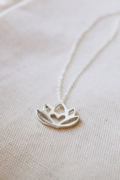 An original Lola&Cash protea necklace featuring a hidden heart— d e t a i l s —-protea measures 2cm wide-hand sawn out of solid sterling silver-completed in a mirror finish-includes a 45cm chainThis pendant is also available in gold as seen in last picturehttps://www.etsy.com/listing/621948340/gold-protea-pendant-solid-9ct-yellow?ref=shop_home_active_1-All Lola&Cash jewellery will arrive gift wrapped>>>——————————<<<>>>——————————<<<Please Note - Made to order - Rush orders can be accommodated upo Delicate Silver Charm Necklace For Mother's Day, Sterling Silver Heart Pendant Necklace With Flower Charm, Nature-inspired Silver Heart Necklace, Silver Flower Charm Necklace With Delicate Chain, Silver Flower Charm Necklaces With Delicate Chain, Delicate Silver Necklace For Meditation, Delicate Silver Flower-shaped Charm Necklace, Delicate Silver Flower Shape Charm Necklace, Nature-inspired Sterling Silver Jewelry For Meditation