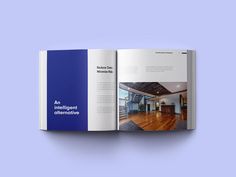 an open brochure showing the inside of a house with wood floors and blue walls