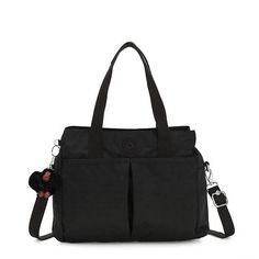 Looking for the ideal everyday bag? Kenzie is a perfect pick! It has an adjustable, removable crossbody strap, a spacious interior, a trendy silhouette, and plenty of pockets for storage! Handbag Outlet, Mini Tote, Everyday Bag, Nylon Bag, Bags Backpacks, Shorts With Pockets, Crossbody Strap, Shoulder Bag Women, Diaper Bag