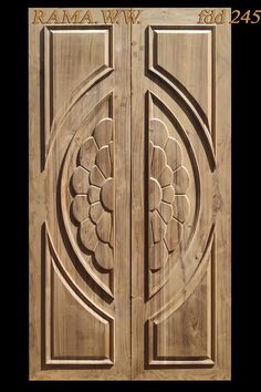 an intricate carved wooden door with the letter g on it's side and bottom panel