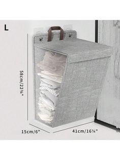 an image of a closet with clothes in it and measurements for the door to be opened