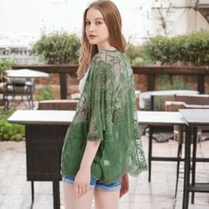 Add a touch of boho flair to your outfit with the Anna-Kaci Women's Short Embroidered Lace Duster Crop Cardigan with Half Sleeves. Blending just the right amount of and modesty, this lace duster keeps your arms and shoulders covered while allowing your outfit to shine through with its sheer lace design. The loose fit, open front, and extra-large armholes ensure a comfortable fit for any body type, creating a dramatic and head-turning flowy look as you walk by. Spring Bohemian Embroidered Cardigan, Bohemian Floral Embroidered Cardigan, Green Bohemian Cardigan For Festival, Floral Embroidered Open Front Summer Cardigan, Floral Embroidered Open Front Cardigan For Summer, Summer Floral Embroidered Open Front Cardigan, Summer Open Front Cardigan With Floral Embroidery, Casual Summer Cardigan With Floral Embroidery, Green Bohemian Summer Outerwear