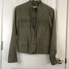 Ann Taylor Loft Women's Xs Military Fatigue Style Shirt Or Light Jacket Shacket Olive Green Fitted Elastic Waist Snap And Zipper Double Closure 5 Functioning Pockets 100% Cotton Measurements Laid Flat 19 Inches Across From Armpit To Armpit 20 Inches Long Front And Back Looks New Unworn Neutral Cottagecore Militarycore Y2k Autumn Transition Grunge Spring Utility Blazer With Pockets, Utility Blazer With Pockets For Spring, Fitted Casual Utility Jacket With Pockets, Fitted Green Utility Jacket With Pockets, Khaki Blazer With Flap Pockets For Spring, Spring Utility Blazer With Snap Buttons, Fitted Casual Utility Jacket With Buttons, Fitted Khaki Button-up Utility Jacket, Casual Fitted Utility Jacket With Button Closure