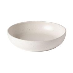 a white bowl with speckles is shown on a white background for use as a serving dish