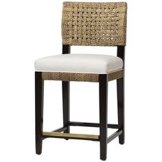 an upholstered bar stool with a white cushion