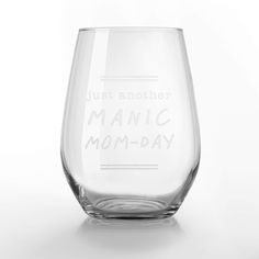 a wine glass with the words just another manic mom - day written on it