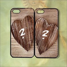 two wooden heart shaped cases with the numbers 2 and 3 painted on them, sitting next to each other