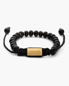 Our all-new Onyx Beaded Bracelet is the versatile accessory you've been looking for. This men's black beaded bracelet has onyx beads, gold details, and an adjustable fit. The perfect choice for easy gifting! Adjustable Onyx Beaded Bracelets, Adjustable Black Beaded Rosary Bracelet, Adjustable Black Wristband With Letter Beads, Black Beaded Name Bracelet With Round Beads, Everyday Black Beaded Bracelets With Round Beads, Black Beaded Name Bracelet, Everyday Hand-strung Black Beaded Bracelets, Black Name Bracelet With Round Beads, Casual Black Wristband With Letter Beads