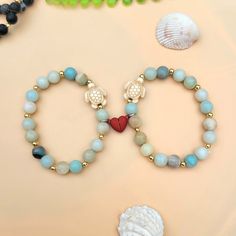 Beautiful Amazonite Crystal Beaded Turtle Heart Matching Bracelets. Excellent As A Unique Gift For Best Friends, Mom And Daughter, Sisters, Grandma And Granddaughter Or Anyone Special You Love. These Lovely Couple Heart Bracelet Are Made With High Quality Materials Decorated With Lots Of 14k Gold Spacer Beads (Tarnish And Water Resistant) Bracelet Size Is Around 6.5 Inches. It Is Made Stretchy So It Can Fit From 6" To 7" If You Have Any Question Please Feel Free To Ask I Will Respond As Soon As Heart-shaped Beaded Bracelets With Natural Stones For Gift, Heart-shaped Natural Stone Beaded Bracelets For Gifts, Heart-shaped Natural Stone Beaded Bracelets As Gift, Heart-shaped Natural Stone Beaded Bracelet Gift, Turquoise Heart-shaped Beaded Bracelet, Turquoise Heart-shaped Beaded Bracelets, Blue Heart-shaped Beaded Bracelets, Blue Heart-shaped Beaded Bracelet, Turquoise Bracelets With Heart Beads For Jewelry Making