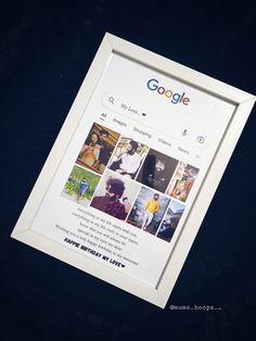 a white framed photo with the google logo on it