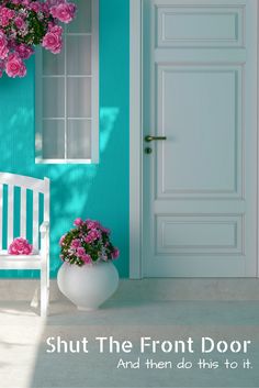 a white bench sitting in front of a blue wall with pink flowers on it and the words we make life and beauty simple