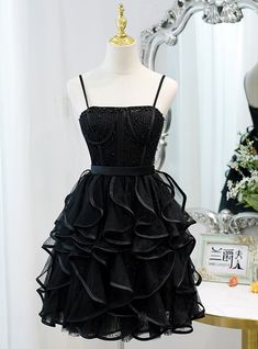 Black Tulle Spaghetti Straps Beading Homecoming Dress Black Tulle Spaghetti Strap Dress, Black Tulle Dress With Spaghetti Straps, Black Corset Dress For Prom With Spaghetti Straps, Black Corset Dress With Spaghetti Straps For Prom, Black Organza Evening Dress For Prom, Black Spaghetti Strap Evening Dress For Prom, Black Organza Evening Dress With Ruffles, Black Corset Dress With Spaghetti Straps For Gala, Black Tulle Corset Dress With Ruffles