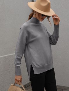 Our Tay Jumper is a classic gray tone in a lovely relaxed fit. This snug knit is sure to keep you warm as it features a high neckline and drop-shoulder long sleeves. Pair with jeans for a lazy day outfit or complete the look with our Rumour Has It Loafer. Size Guide: Ambre is 5’2” tall, and has a 33.2” bust, 24.5”waist, & 36.7” hips. She is wearing a S / US 4 / AU 8. This jumper is true to size. Feature: Relaxed fit. Unlined (not sheer). Turtleneck. Ribbed detailing on neckline, cuffs and hemlin Heather Grey Knit Sweater For Winter, Trendy Gray Sweater For Everyday, Trendy Gray Everyday Sweater, Casual Winter Turtleneck For Everyday, Gray Sweater For Everyday, Gray Everyday Sweater, Plain Turtleneck Sweater For Fall, Gray Turtleneck Sweater With Ribbed Cuffs, Oversized Heather Grey Winter Sweater