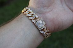 FAST SHIPPING!*TRUSTED SELLER**2300+ TRANSACTIONS* -Will be shipped through USPS with First Class Mail that includes tracking so you'll get it quick! -Don't confuse this with those cheap low quality cuban links that have glued in stones. -Premium 14k white gold OR 18k yellow gold plated diamond cuban link Bracelet! -Plating is PVD which is the highest quality. -Stones are high quality VVS simulated lab diamonds(CZ)! Hand prong set and not glued in like the cheap ones! -Very nice box clasp! -13mm Luxury Cuban Link Tennis Bracelet With Cubic Zirconia, Yellow Gold Cubic Zirconia Cuban Link Bracelet For Gift, Luxury Cubic Zirconia Cuban Link Tennis Bracelet, Luxury Cuban Link Chain Bracelet With Cubic Zirconia, Luxury Cuban Link Chain Bracelet In Cubic Zirconia, Gold Cuban Link Diamond Bracelet Iced Out, Diamond Cuban Link Bracelet For Anniversary, Elegant Cuban Link Bracelet In Cubic Zirconia For Anniversary, Gold Cuban Link Tennis Bracelet With Diamond Accents