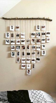 a bedroom with pictures hanging on the wall