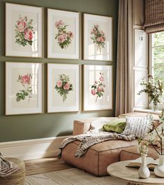 a living room filled with furniture and flowers on the wall above them is a coffee table