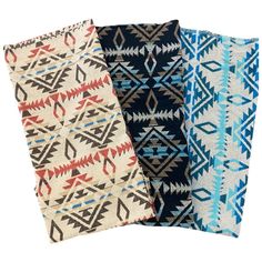 three pieces of fabric with different colors and patterns on the front, one in black, one in white, and one in blue