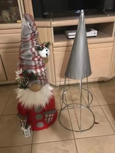 a christmas decoration is sitting on the kitchen floor