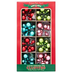 christmas tree ornaments in a red box