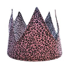 This super cute handmade birthday crown will make the perfect gift for a special birthday. An eco-friendly replacement to standard paper hats, these crowns can be used time and time again. Why not make it part of your family tradition? These hats are fully machine washable so no need to worry about the cake smash photos.  There are 2 options for fastening; fabric ties or fabric covered elastic. If selecting the elastic option then please note the circumference of the recipient's head when purchasing for a secure fit. Made from 100% cotton with a stiffened interior, they are durable and make to last. Washing instructions: Machine washable at 30o Do not tumble dry, Stretch out to reshape whilst wet, Iron without steam Whimsical Tall Crown As Gift, Adjustable Pink Crown With Round Shape, Handmade Pinched Crown As A Gift, Handmade Pinched Crown As Gift, Zero Waste Party, Montessori Birthday, Paper Hats, Fabric Crown, Paper Hat