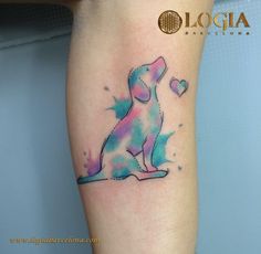 a dog with a heart tattoo on its leg