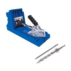 a set of tools that are in a blue box with screws and pliers