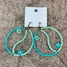 Free People Beaded Peace Sign Earrings Teal, Blue, New With Tags Blue Round Beaded Earrings With Colorful Beads, Blue Beaded Earrings For Beach, Blue Round Beaded Earrings For Beach, Colorful Blue Beaded Earrings For Beach, Trendy Blue Earrings With Dangling Beads, Trendy Blue Round Bead Earrings, Blue Beaded Hoop Earrings For The Beach, Blue Hoop Earrings With Round Beads For Beach, Trendy Blue Beaded Earrings