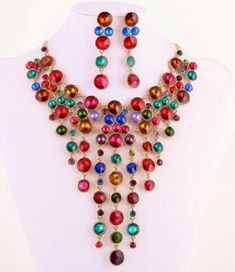 Elegant Cascade of Multi Jewel Colors Rhinestones Statement Fashion Necklace Set Click to Enlarge Click to Enlarge A Girl Can Never Have Too Much Jewelry Elegant Cascade of Multi Jewel Colors Rhinestones Statement Fashion Necklace Set Necklace 17" + Ext. Lobster Claw Closure Drop 6" Post Earrings 3"  Jewelry To Make You Look Fabulous Check out my Ebay store for more beautiful Jewelry HTTPS://stores.ebay.com/Mays-Collectibles?_rdc=1 Add me to your Favorite Seller List! Shipping cost includes padded envelopes, Bubble wrap, Boxes, etc Combined shipping is always available to save YOU money PayPal Please DO NOT DUPLICATE OR COPY! Template Made By: © InkFrog.com  Auction Templates, Logos, Store fronts and more!   inkfrog terapeak Multicolor Metal Rhinestone Necklace For Party, Multicolor Jeweled Beaded Necklace For Party, Multicolor Metal Jewelry Sets For Party, Multicolor Crystal Necklace With Rhinestones, Party Multicolor Rhinestone Necklace, Party Crystal Beaded Necklaces With Dangle, Crystal Beaded Necklace For Party With Dangle, Multicolor Rhinestone Necklace For Party, Crystal Beaded Dangle Necklaces For Party