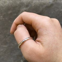 A sterling silver thumb ring with a hammered finish. This simple piece is our first thumb ring. It can be worn individually but is also perfect for stacking with other rings. It has a more substantial feel which would suit larger hands and lends itself as a unisex gift. With a round profile this ring rolls on and off easily and is a joy to wear. Ring comes in a velvet pouch and in 4 sizes. Below is a sizing guide using US sizes: M/L = USA 8 L = USA 9 XL = USA 10 XXL = USA 11 Band is made from st Unique Locket Necklace, Unique Locket, Sterling Silver Thumb Rings, Thumb Rings Silver, Star Charm Necklace, Birthstone Rings, Thumb Ring, Unisex Gift, Gold Ring Stack