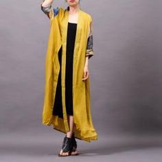 Yellow Long Cardigan For Fall, Long Yellow Fall Cardigan, Yellow V-neck Cardigan For Layering, Casual Yellow Summer Cardigan, Long Sleeve Gold Cardigan For Spring, Gold Long Sleeve Cardigan For Spring, Yellow Outerwear For Spring Layering, Yellow Bohemian Cardigan For Summer, Bohemian Yellow Cardigan For Spring