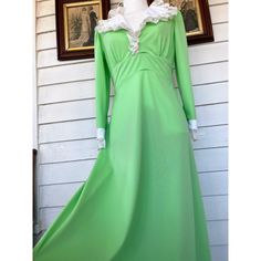 "Here for your consideration is a nice vintage 1970s maxi dress. It is a handmade dress in a poly knit. Based on the measurements, I would guess around a size M. Here are the measurements with the dress flat from one side. Shoulders 15.5: arm pit to pit 16.5\" waist 15.5\" shoulder to hem 55\". This dress is recently cleaned and has no stains or holes. It is in good wearable condition." Fitted Green Maxi Dress With Empire Waist, Retro Fitted Maxi Vintage Dress, 1970s Fitted Maxi Length Vintage Dress, 1970s Style Fitted Maxi Vintage Dress, Fitted Retro Maxi Vintage Dress, Fitted Retro Maxi Length Vintage Dress, Retro Full-length Fitted Dress, Retro Fitted Full-length Dress, Full Length Fitted Retro Dress