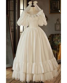 Buy vintage princess style ivory satin lace baby collar wedding dress bubble sleeved at wholesale price online. Free shipping and pro custom service since 2009. Luxury Cream Princess Dress For Dress-up, Cheap White Princess Dress, Victorian Wedding Dress Veaul, Old Timey Princess Dresses, Luxury White Victorian Dress With Fitted Bodice, Casual Vintage Princess Dress, Luxury White Victorian Dress Costume, Luxury Cream Romantic Victorian Dress, Cheap Princess Dress With Short Sleeves And Ruffles