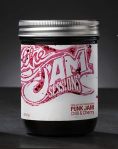 a jar of jam sitting on top of a table