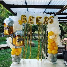 a beer themed party with balloons and streamers