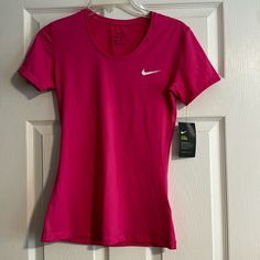 Nike Women’s Dry Fit Size M Fitted Nike T-shirt For Summer, Nike Fitted Sports Shirt, Nike Fitted Shirt For Sports, Fitted Nike Sports Shirt, Fitted Nike Shirt For Sports, Nike Workout T-shirt For Spring, Spring Nike Workout T-shirt, Pink Moisture-wicking T-shirt, Nike Fitted Short Sleeve Top