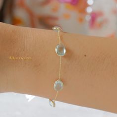 "18k Gold Chain Bracelet, Natural Aquamarine Bracelet, Yellow Gold Bracelet, Genuine Gemstone Bracelet, Birthday Gifts GEMSTONE DETAILS  ✦ Gemstone: Aquamarine ✦ Gemstone Type: Natural ✦ Gemstone Shape: Oval ✦ Gemstone Color: As Images ✦ Gemstone Cut : Plain ✦ Number of Gemstones: 1 ✦ Gemstone Grade: Excellent ✦ Gemstone Weight : 2 Carat METAL DETAILS  ✦ Metal: 18K Gold ✦ Metal Color: Yellow Gold/White Gold/Rose Gold ✦ Bracelet Size : 7.5 \" ✦ Total Weight : 3 Gram  ✦ Bracelet Box: Yes CUSTOMISATION DETAILS  We can customize any piece of fine jewelry. You can simply message us on Etsy or drop a text at +91-7357229656 (WhatsApp/iMessage) to let us know about all the customization you want. Customization can include  ✦ The Gemstone: This ring can be made in Emerald, Ethiopian Opal, Rainbow M Luxury Birthstone Bracelets For Anniversary, Luxury Gold Gemstone Bracelet As A Gift, Luxury Gold Gemstone Bracelet Gift, Gold Oval Bracelet With Gemstone, Yellow Gold Gemstone Bracelets For Anniversary, Anniversary Yellow Gold Bracelets With Gemstones, Anniversary Yellow Gold Gemstone Bracelets, White Gold Bracelet With Gemstone Accents For Gift, Formal Yellow Gold Bracelets With Natural Stones