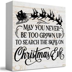 a wooden sign that says, may you never be too grown to search the skies on christmas