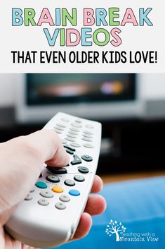 a person holding a remote control in their hand with the words, brain break videos that even older kids love