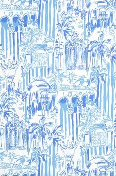 a blue and white wallpaper with palm trees