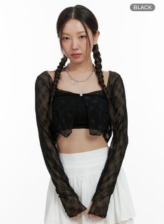 Product Detail Style : Romantic, Feminine Occasion : Festival Detail : Ribbon, Pearl, See-through Material : Spandex, Nylon Sleeve : Long sleeve Length : Crop Nylon 90 Spandex 10 Color : Black, Light beige Made in Korea Model Size Model is wearing size S/M and the color Black. Height : 5'5" | 166cm / Top : S / Bottom : S (25 inch) .prddescription table, .prddescription td, .prddescription th { border : 1px solid black; border-collapse : collapse; padding: 10px; } Size(Inch) Size Shoulder Bust Sl Black Long Sleeve Nylon Top, Long Sleeve Sheer Gothic Top, Fitted Black Summer Shrug, Gothic Tops With Sheer Sleeves For Spring, Trendy Long Sleeve Stretch Shrug, Black Fitted Shrug For Summer, Fitted Black Shrug For Summer, Black Shrug For Spring Layering, Black Shrug For Spring