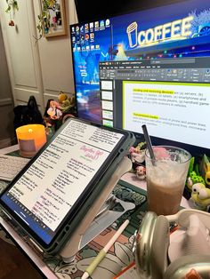 a laptop computer sitting on top of a desk