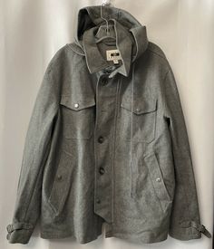 Beautiful quality well made coat. 8 pockets! Joseph Abboud XL wool blend detachable hooded jacket coat. Zip and button. Hood has toggles and bill. 25" armpit to armpit. 28.5" length. Gray Winter Hooded Jacket With Pockets, Gray Hooded Winter Jacket With Pockets, Gray Hooded Outerwear With Adjustable Hood, Gray Outerwear With Drawstring Hood For Cold Weather, Wool Hooded Jacket For Cold Weather In Fall, Casual Gray Wool Coat With Pockets, Classic Hooded Wool Outerwear, Wool Outerwear With Double-lined Hood For Cold Weather, Cold Weather Wool Outerwear With Double-lined Hood