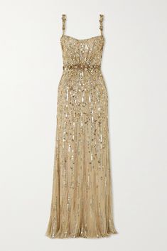 Jenny Packham's sparkly gowns are worn time and again by some of the world's most glamorous women. Certain to leave you feeling like Hollywood royalty, this 'Bright Gem' dress from the Pre-Fall '22 collection is made from soft tulle embellished with scores of glistening sequins, beads and crystals. Wear it with strappy sandals and a deep red lip. Deep Red Lip, Sparkly Gowns, Sparkly Gown, Gown Gold, Gold Gown, Soft Tulle, Tulle Gown, Jenny Packham, Red Lip