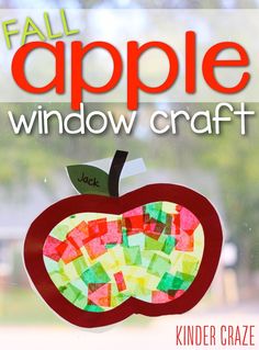 an apple window craft made out of paper and colored construction paper with the words fall apple on it